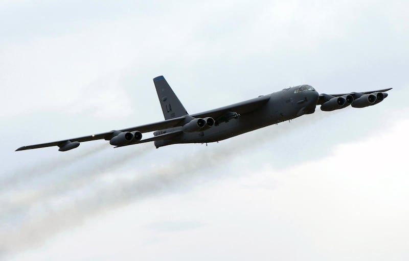 A US Air Force B-52 Bomber performs a fly-by during the first public session of the Australian International Airshow in Melbourne, 23 March 2007. A crowd of nearly 200,000 people are expected to have attended the airshow by the end of the weekend sessions. AFP PHOTO/Paul CROCK (Photo by PAUL CROCK / AFP)