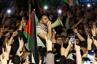 People chant slogans during a demonstration in support of Gaza near the Israeli embassy on March 28. AFP