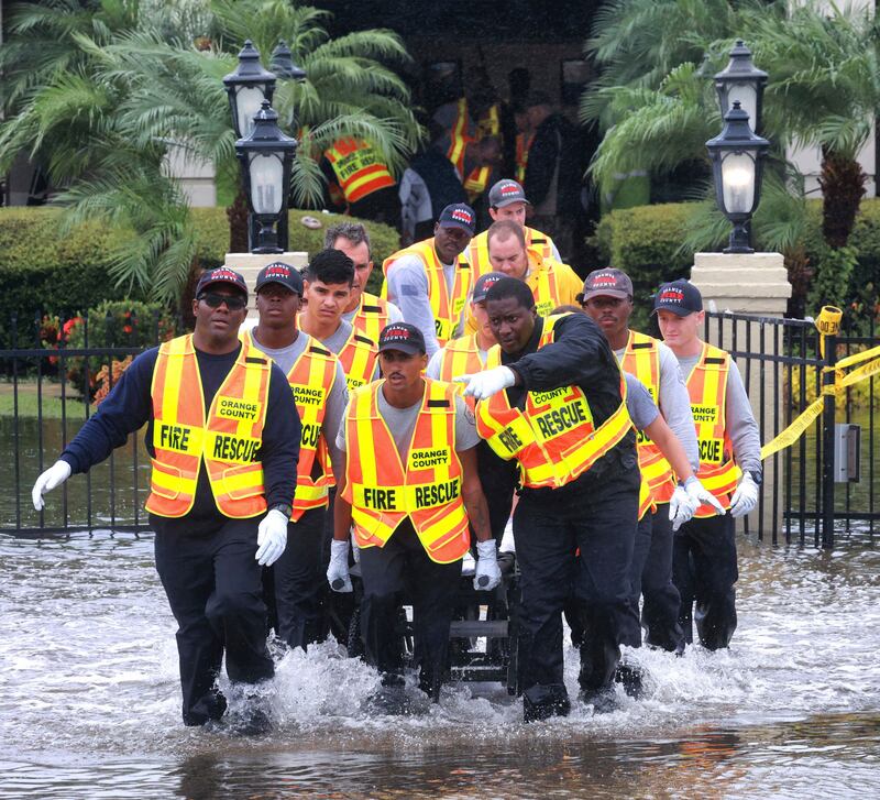 Rescuers evacuate residents from the Avante at Orlando nursing home in Florida, during floods caused by Hurricane Ian. AP