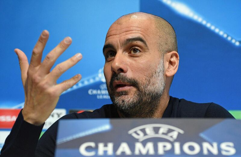 Manchester City's Spanish manager Pep Guardiola attends a press conference at the City Football Academy in Manchester, north west England on March 6, 2018, on the eve of their UEFA Champions League round of sixteen second leg football match against FC Basel. / AFP PHOTO / OLI SCARFF
