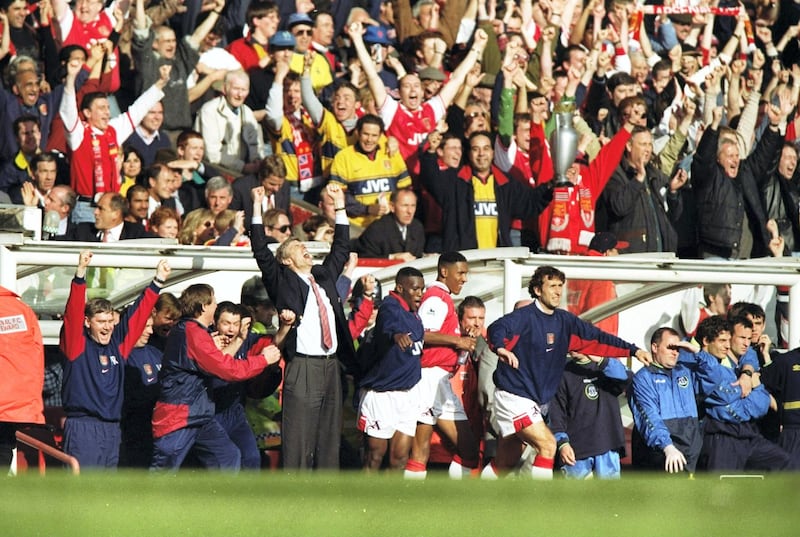 3 May 1998:  Manager Arsene Wenger and the Arsenal bench celebrate winning the championship after the FA Carling Premiership match against Everton at Highbury in London. Arsenal won 4-0 to secure the title. \ Mandatory Credit: Ben Radford /Allsport