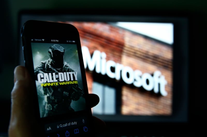 Microsoft has promised to keep Activision Blizzard's popular 'Call of Duty' franchise available on Sony PlayStation consoles rather than make it exclusive to its own Xbox. AP