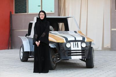 Al Ain, UAE, October 31, 2013:

Reem Al Marzouqi saw a video of an armless pilot in the U.S. airforce 5 years ago. After finding out that this pilot could fly but not drive, she decided to make a car that would only require the use of one's feet. It is seen here along with its "innovator" (she did not want to use the word invention). 

Ms. Marzouqi, at the age of 22, is also a fashion designer and is currently majoring in Architecture at the UAE University (UAEU), where the shoot took place. 

Lee Hoagland/The National
 *** Local Caption ***  LH1031_FOOT_CAR_03.jpg