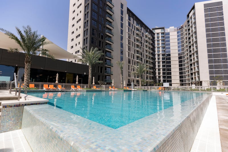 Communal swimming pool at Expo Village in Dubai. Photo by Chris Whiteoak / The National