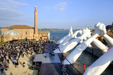  Lorenzo Quinn’s ‘Building Bridges’ sculpture at the Venice Biennale, which has postponed its exhibitions. Getty Images