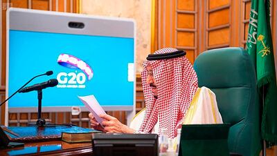 FILE - In this March 26, 2020, file photo released by Saudi Press Agency, SPA, Saudi King Salman, chairs a video call of world leaders from the Group of 20 and other international bodies and organizations, from his office in Riyadh, Saudi Arabia. The Nov. 21-22, 2020, Group of 20 summit, hosted by Saudi Arabia, will be held online this year because of the coronavirus. The pandemic has offered the G-20 an opportunity to prove how such bodies can facilitate international cooperation in crises â€” but has also underscored their shortcomings. (Saudi Press Agency via AP, File)