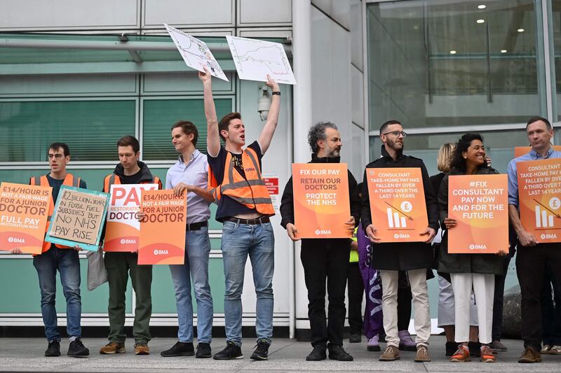 NHS workers at a picket line outside University College Hospital, central London. AFP