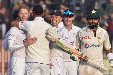 Cricket - First Test - England v Pakistan - Pindi Cricket Stadium, Rawalpindi, Pakistan - December 4, 2022 England's players celebrate the dimissal of Pakistan's captain Babar Azam REUTERS/Tanveer Shahzad NO RESALES.  NO ARCHIVES