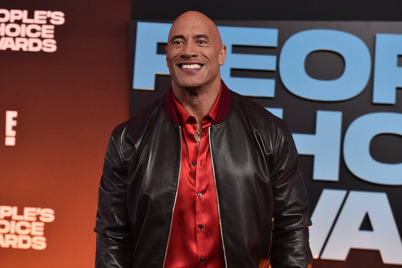 Dwayne 'The Rock' Johnson has divided his fans for his praise of Rogan. AP