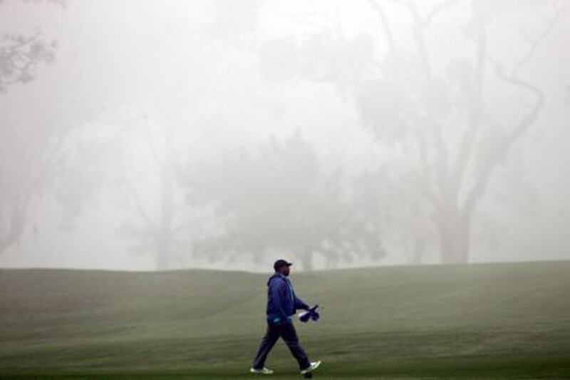 Fog lies across the North Course at Torrey Pines.