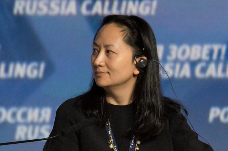 FILE PHOTO: FILE PHOTO: Meng Wanzhou, Executive Board Director of the Chinese technology giant Huawei, attends a session of the VTB Capital Investment Forum "Russia Calling!" in Moscow, Russia October 2, 2014. REUTERS/Alexander Bibik/File Photo/File Photo