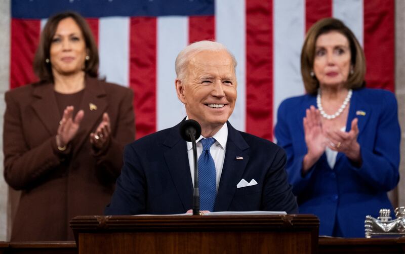 President Joe Biden delivers the 2022 State of the Union address flanked by Vice President Kamala Harris and former House speaker Nancy Pelosi. Reuters