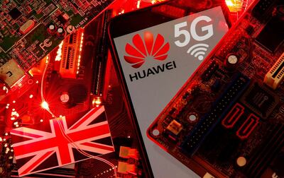 The British flag and a smartphone with a Huawei and 5G network logo are seen on a PC motherboard in this illustration picture taken January 29, 2020. REUTERS/Dado Ruvic/Illustration