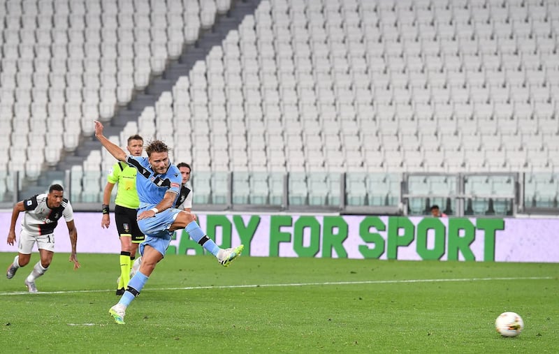 Lazio's Ciro Immobile scores a penalty to make it 2-1. EPA