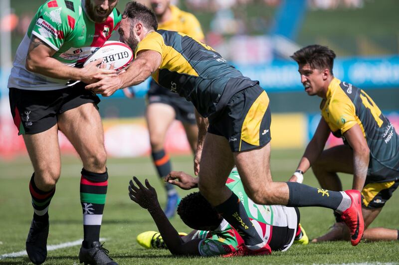 DUBAI, UNITED ARAB EMIRATES - DECEMBER 1, 2018. 

DUBAI HURRICANES, yellow, win the GULF MEN'S LEAGUE game against ABU DHABI HARLEQUINS, 
on the final day of this year's Dubai Rugby Sevens.

(Photo by Reem Mohammed/The National)

Reporter: 
Section:  NA POAN