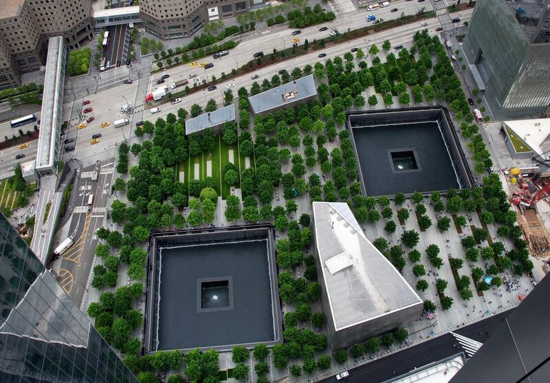 FILE - In this June 7, 2018, file photo, the September 11 Memorial and Museum are seen from an upper floor of 3 World Trade Center in New York. A U.S. Army soldier was arrested Tuesday, Jan. 19, 2021, in Georgia on terrorism charges after he spoke online about plots to blow up New York City's 9/11 Memorial and other landmarks and attack U.S. soldiers in the Middle East, authorities said. (AP Photo/Mark Lennihan, File)