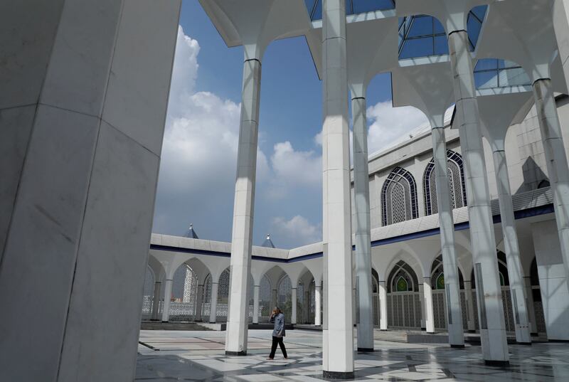 A worshipper at Sultan Salahuddin Abdul Aziz Mosque in Shah Alam, Malaysia for Friday prayers. Reuters