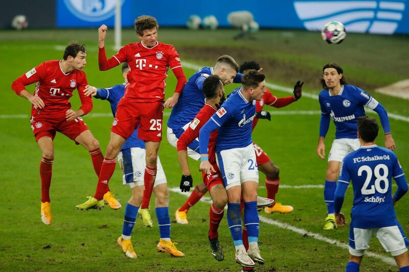Bayern Munich's Thomas Mueller heads home their third goal in their 4-0 Bundesliga win at Schalke in Gelsenkirchen on January 24. AFP