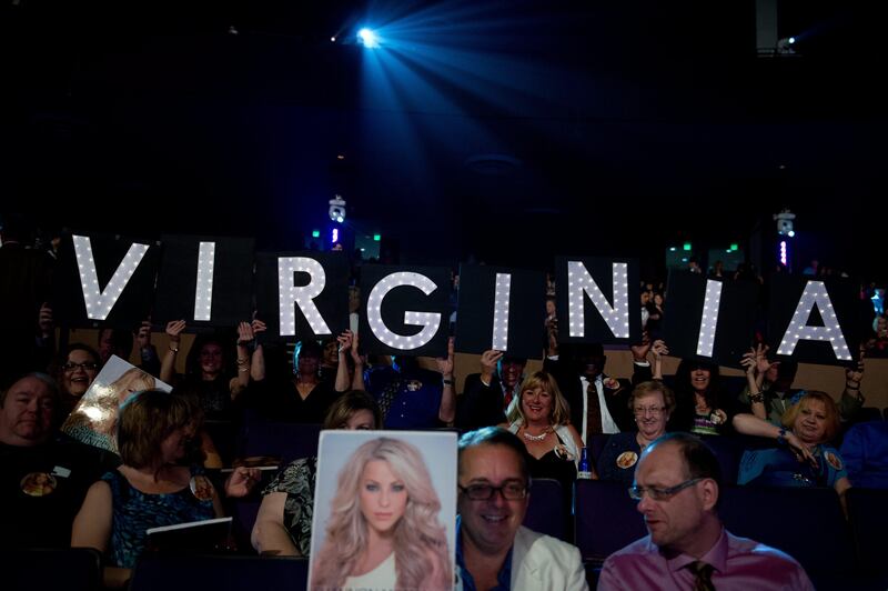 Friends and Family of Miss Virginia USA 2013, Shannon McAnally, show their support before the 2013 MISS USA Competition at PH Live in Las Vegas, Nevada on June 16, 2013.      AFP PHOTO / Miss Universe Organization L.P., LLLP / DARREN DECKER  / HANDOUT  == RESTRICTED TO EDITORIAL USE / MANDATORY CREDIT: "AFP PHOTO / Miss Universe Organization L.P., LLLP / DARREN DECKER / NO SALES / NO MARKETING / NO ADVERTISING CAMPAIGNS / DISTRIBUTED AS A SERVICE TO CLIENTS ==
 *** Local Caption ***  359572-01-08.jpg