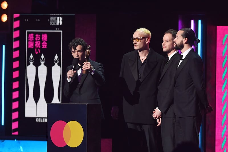 The 1975 with their award for Best Rock/Alternative Act. EPA