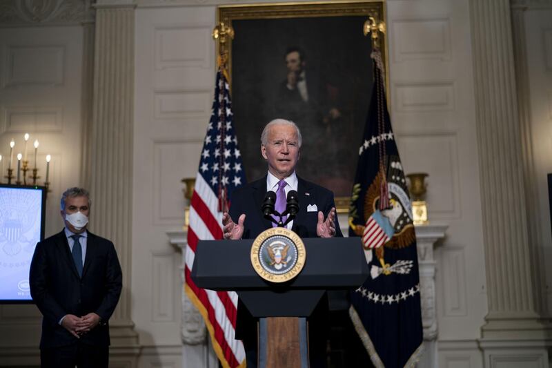 U.S. President Joe Biden delivers remarks on Covid-19 pandemic in the State Dining Room of the White House in Washington, D.C., U.S., on  Tuesday, Jan. 26, 2021. Biden said his administration intends to order 100 million more doses each of Pfizer Inc. and Moderna Inc.’s coronavirus vaccines, and at least temporarily speed up shipments to states to about 10 million doses a week. Photographer: Doug Mills/The New York Times/Bloomberg