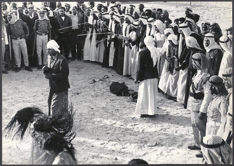 A group performing Al Ayala traditional dance, circa 1970s. Copyright Zaki Nusseibeh