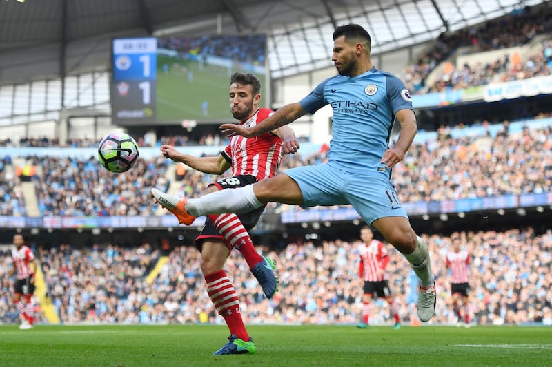 MANCHESTER, ENGLAND - OCTOBER 23:  Sam McQueen of Southampton closes down Sergio Aguero of Manchester City during the Premier League match between Manchester City and Southampton at Etihad Stadium on October 23, 2016 in Manchester, England.  (Photo by Laurence Griffiths/Getty Images)