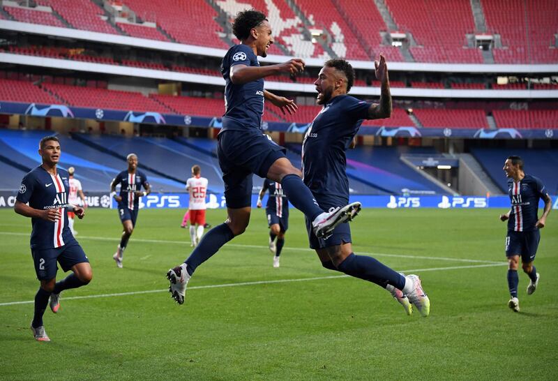 Marquinhos (L) celebrates with Neymar against Leipzig. Getty
