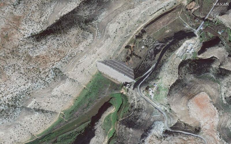 A satellite photo shows the upper dam on Wadi Derna before it collapsed when torrential trains from Storm Daniel caused its reservoir to fill beyond its capacity. Maxar Technologies / AFP