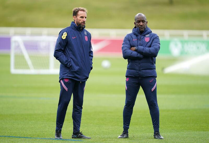 England manager Gareth Southgate, left, and coach Chris Powell. PA