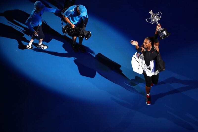 MELBOURNE, AUSTRALIA - JANUARY 28:  Serena Williams of the United States walks with the Daphne Akhurst Trophy after winning the Women's Singles Final against Venus Williams of the United States on day 13 of the 2017 Australian Open at Melbourne Park on January 28, 2017 in Melbourne, Australia.  (Photo by Cameron Spencer/Getty Images)