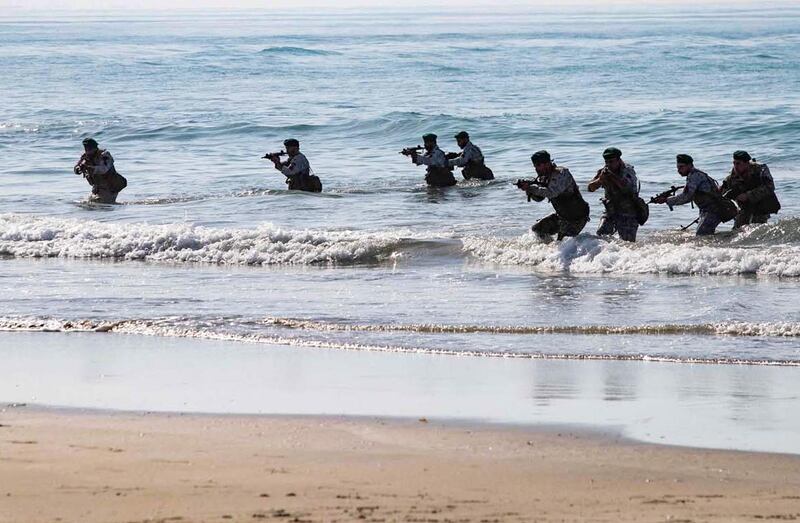 Iranian soldiers during a military exercise in the Gulf, near the strategic strait of Hormuz in southern Iran during a three-day exercise. AFP, HO via Iranian Army website