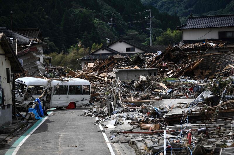 Debris litter a village following heavy rain in Kumamura, Kumamoto prefecture. AFP