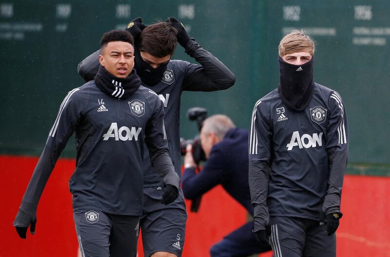 Left to right: Manchester United's Jesse Lingard, Brandon Williams and Harry Maguire. Reuters