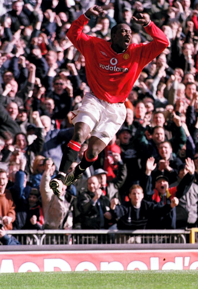 25 Feb 2001:  Dwight Yorke of Man Utd celebrates after scoring his second goal during the FA Carling Premiership match between Manchester United and Arsenal played at Old Trafford in Manchester. Mandatory Credit: Gary M. Prior/ALLSPORT