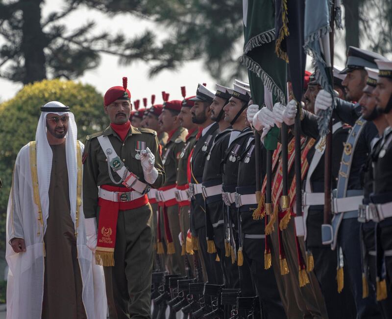 ISLAMABAD, PAKISTAN - January 06, 2019: HH Sheikh Mohamed bin Zayed Al Nahyan, Crown Prince of Abu Dhabi and Deputy Supreme Commander of the UAE Armed Forces (back L),  inspects honor guard during a reception at the Prime Minister's residence.

(  Mohammed Al Hammadi / Ministry of Presidential Affairs )
---