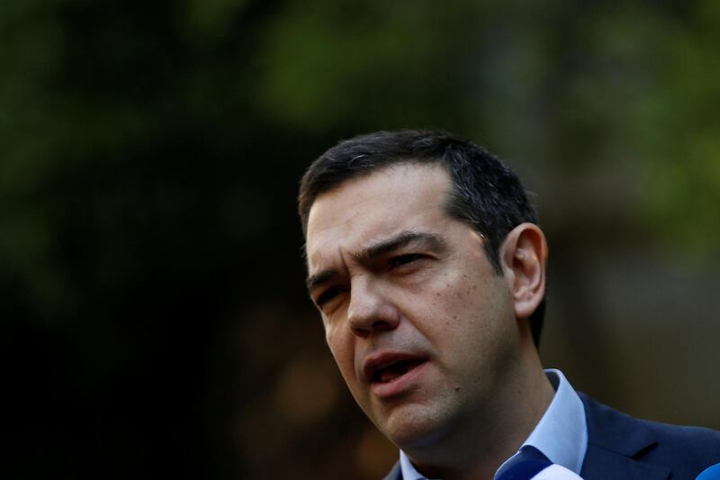 FILE PHOTO: Greek Prime Minister Alexis Tsipras makes statements to the press following his meeting with resigned coalition partner Panos Kammenos (not pictured) in Athens, Greece, January 13, 2019. REUTERS/Alkis Konstantinidis/File Photo