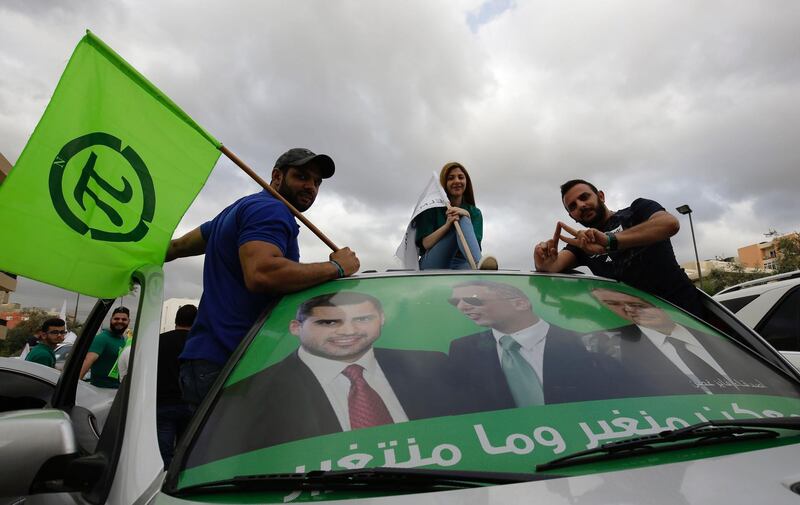 Supporters of the Marada political party parade in Zgharta as they celebrate the parliamentary elections results. Ibrahim Chalhoub / AFP Photo