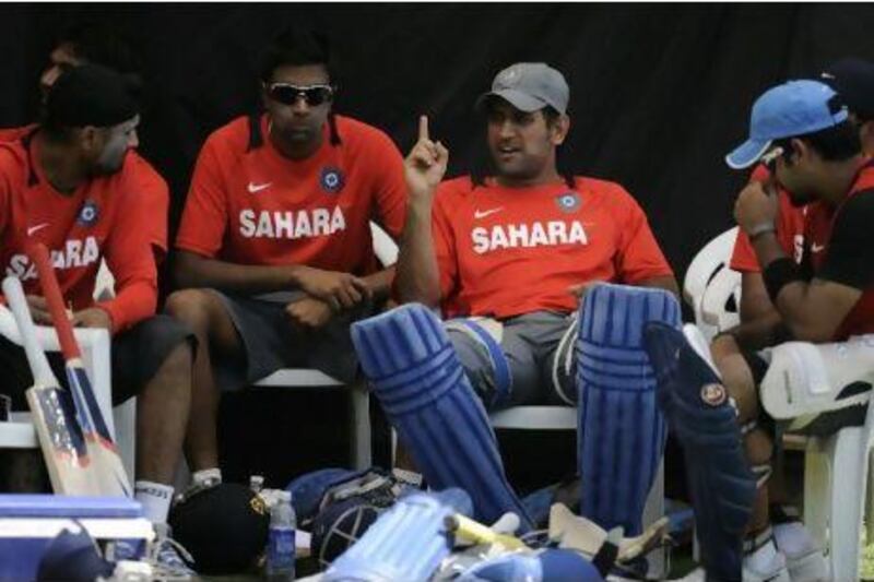 Captain MS Dhoni, second from right, has kept the Indian team away from the media. Indranil Mukherjee / AFP