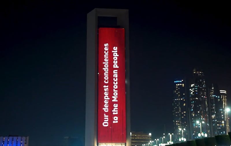 The Adnoc building in Abu Dhabi lights up in the colours of the Moroccan flag in solidarity with those affected by the earthquake. Abu Dhabi Media Office