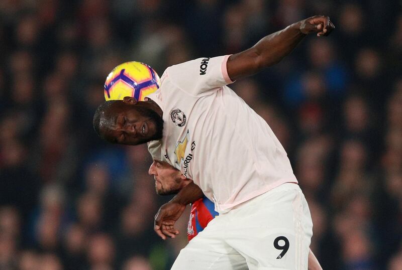 Lukaku goes for an aerial challenge with Palace's Joel Ward. Reuters