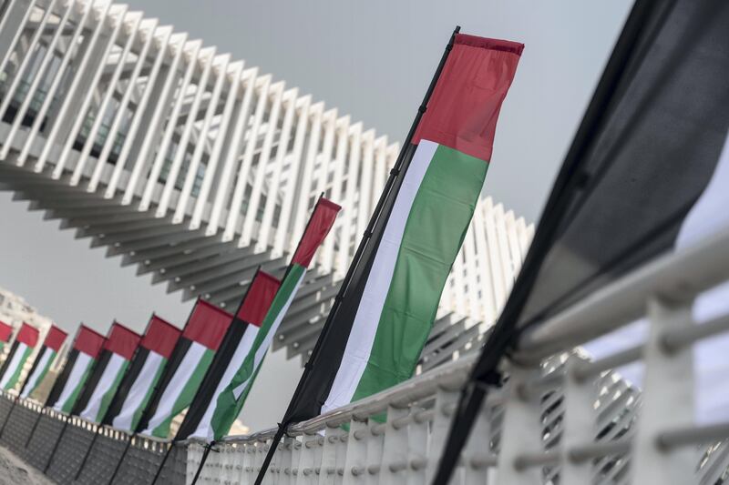 DUBAI, UNITED ARAB EMIRATES. 01 NOVEMBER 2017. UAE Flag day. UAE Flags line the new extension of the creek by the Al Wasl Rd bridge in Jumeirah. (Photo: Antonie Robertson/The National) Journalist: NONE. Section: National.