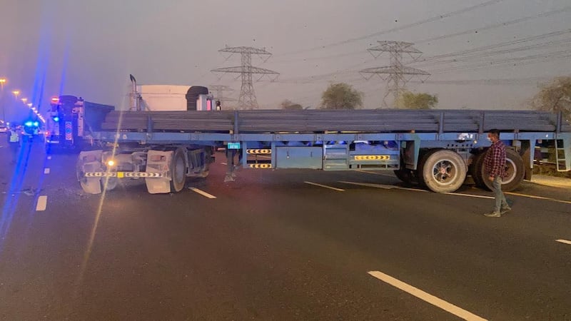 A lorry was parked on the hard shoulder of the motorway when the bus slammed into it. Courtesy: Dubai Police