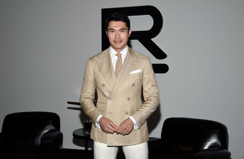 Henry Golding attends the Ralph Lauren Fall/Winter 2022 fashion show at the Museum of Modern Art in New York.  AP