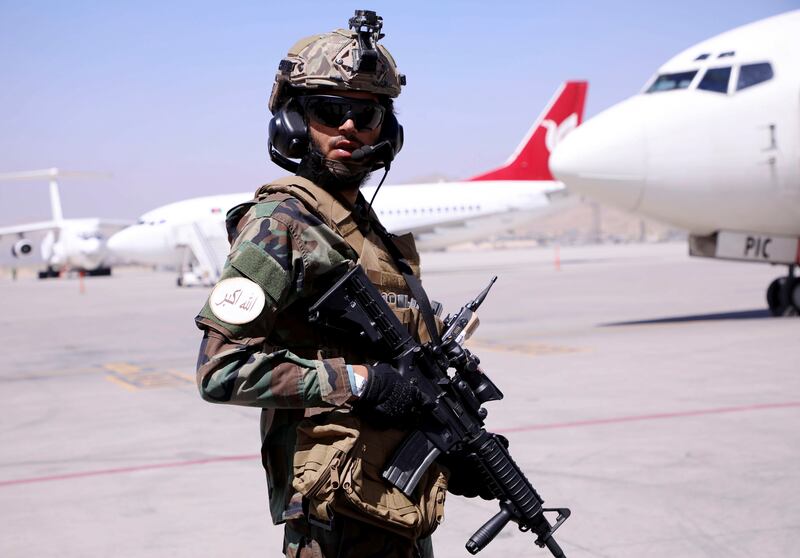 A member of the Taliban forces stands guard at Hamid Karzai International Airport in Kabul, Afghanistan. Reuters