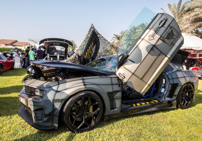 ABU DHABI, UNITED ARAB EMIRATES, 28 OCTOBER 2018 - A Camaro, F-16 firefighter designed Camaro owned by Nasser Alsaba  at the Street Meet modified cars event, Abu Dhabi City Golf Club.  Leslie Pableo for The National for Adam Workman's story