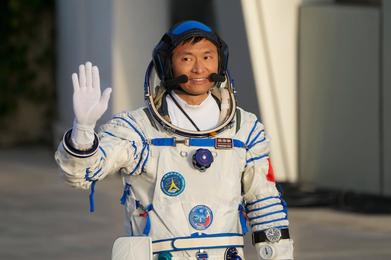 Chinese astronaut Gui Haichao waves during a send-off ceremony for his manned space mission at the Jiuquan Satellite Launch Center in northwestern China, Tuesday, May 30, 2023.  (AP Photo / Mark Schiefelbein)