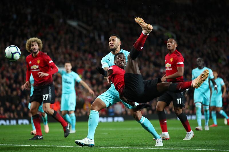 Manchester United's Paul Pogba attempts an overhead kick. Getty Images