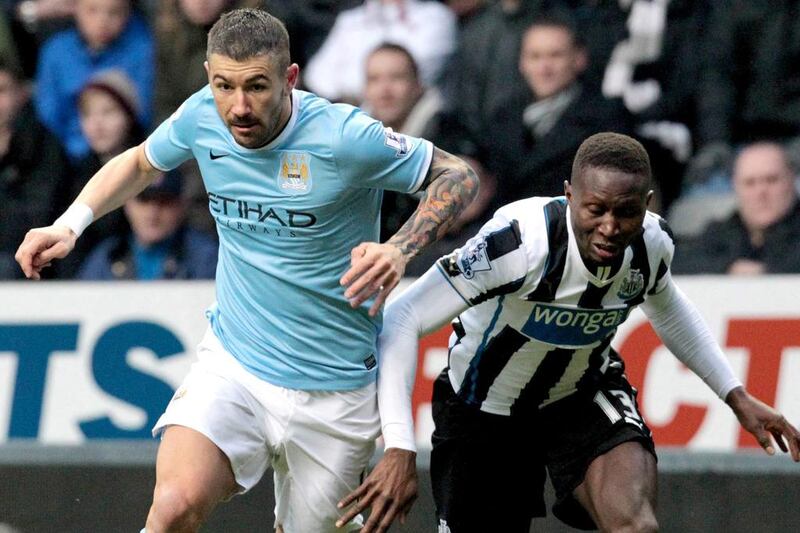 Left-back: Aleksandr Kolavor, Manchester City. Impressive going forward and defiantly defensively, he set up Edin Dzeko's opening goal at St James' Park. Lindsey Parnaby / EPA