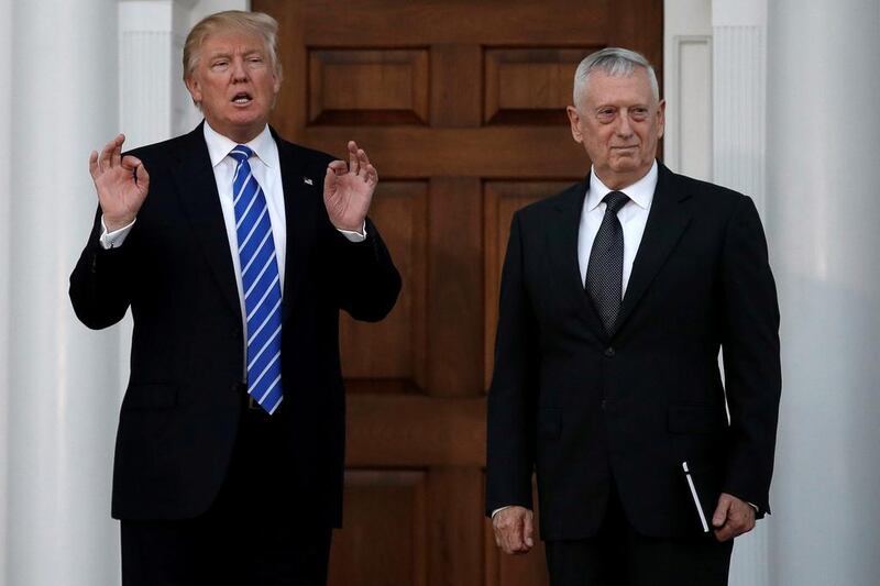 US president-elect Donald Trump with retired Marine general James Mattis after a meeting at the Trump National Golf Club in Bedminster, New Jersey, on November 19, 2016.  Mike Segar / Reuters
